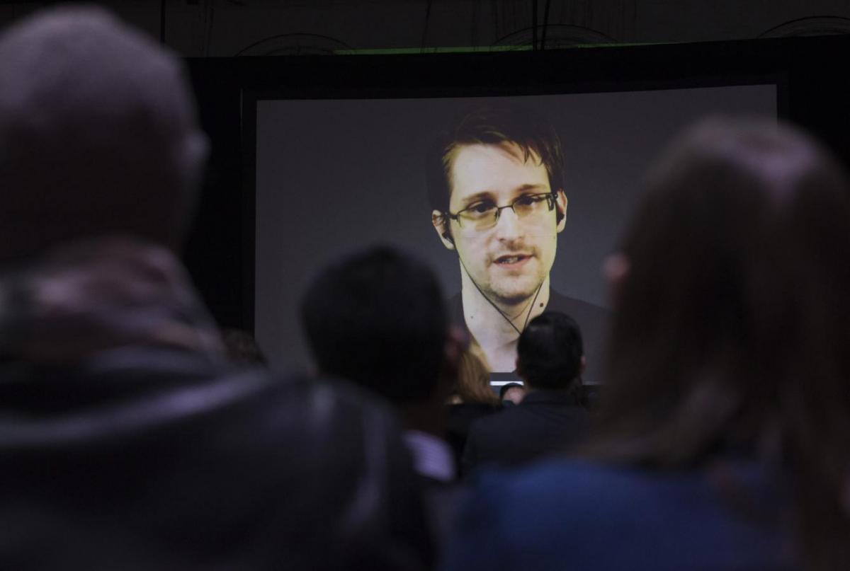 File photo of Snowden appearing live via video during a student organized world affairs conference at the Upper Canada College private high school in Toronto